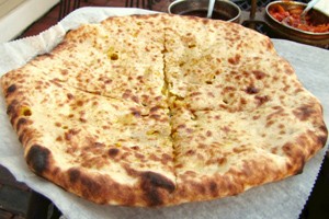 A cheesy naan, which Walmsley swears by with a curry.
