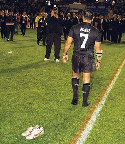 Stacey Jones leaves his boots in the middle of the Halliwell Jones Stadium after the game, as he retires from Rugby League.