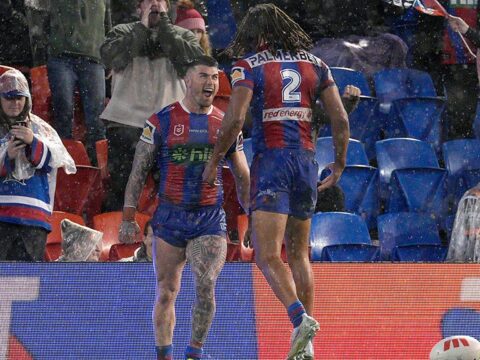 Bradman Best celebrates scoring the winning try for Newcastle Knights against Wests Tigers